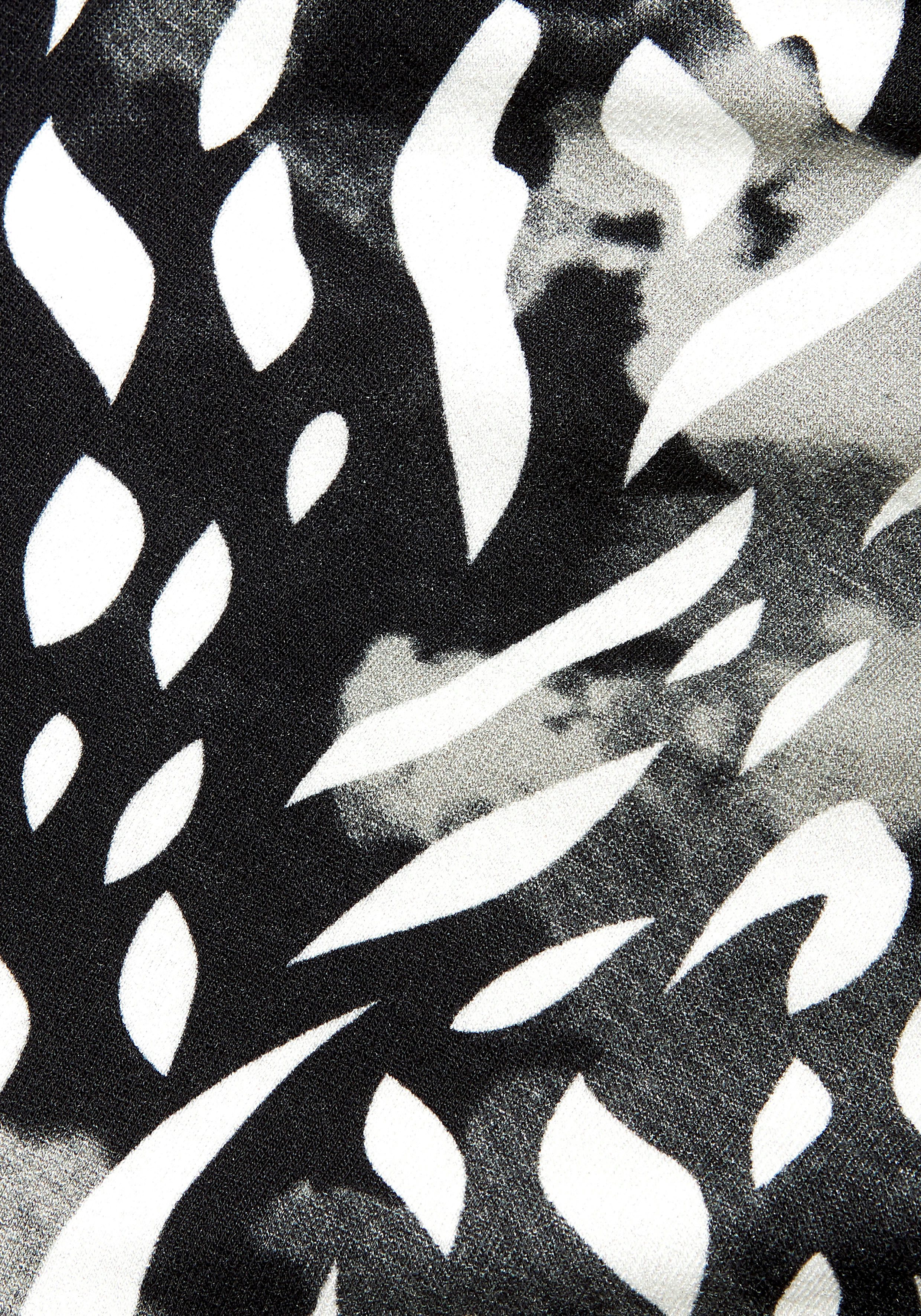 Lascana Jerseyrok met plooien aan de zijkant en split, midi rok met all-over print