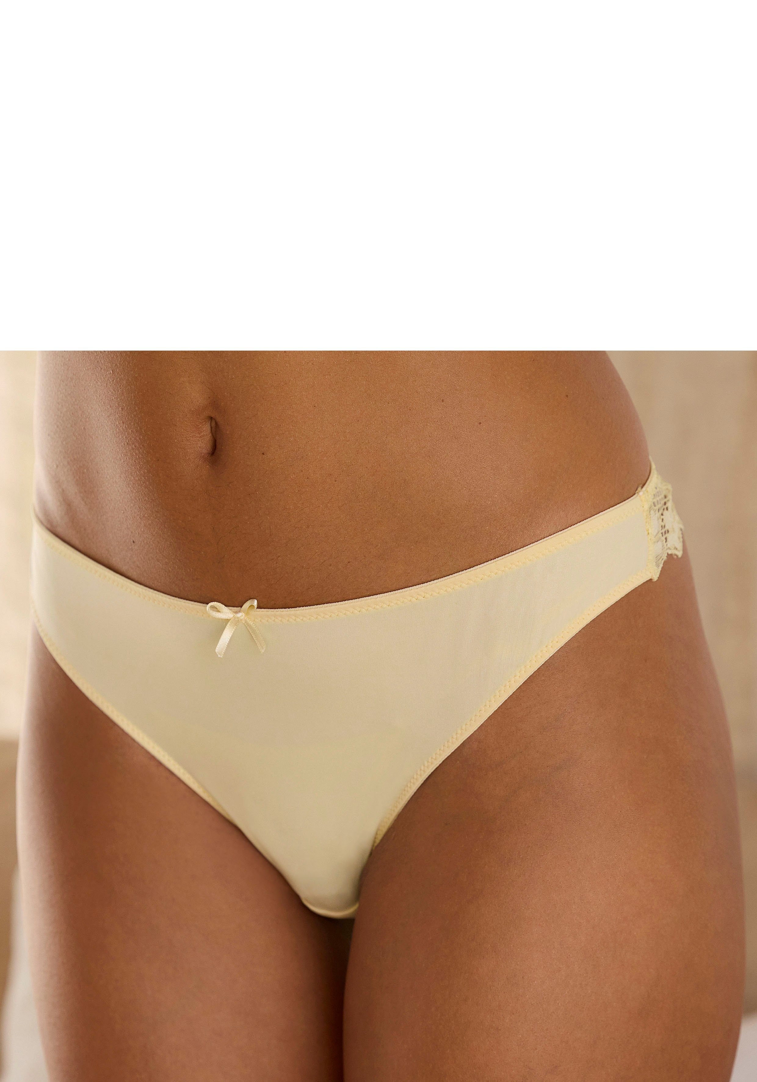 Petite fleur String achter geheel van fijne jacquard-kant (3 stuks)