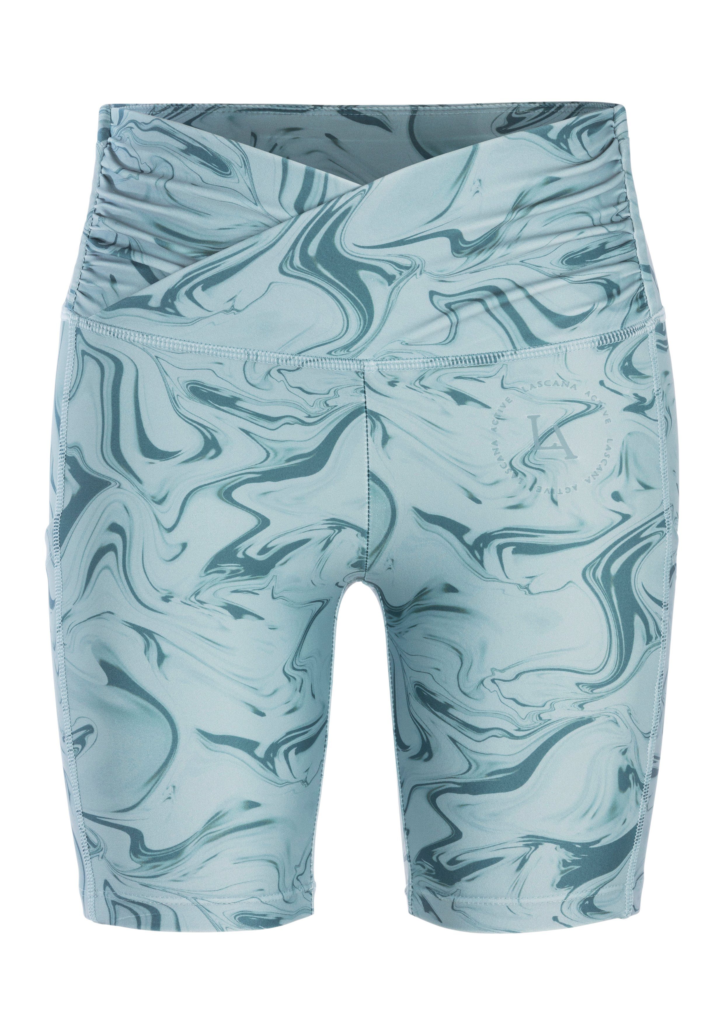 active by Lascana Functionele broek -Sportbroek Sportbroek met allover print en kleine ritszak